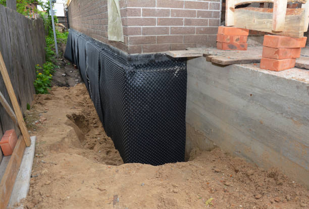 SJ Waterproofing Pros technician performing targeted Emergency Waterproofing assessment in Vienna, GA